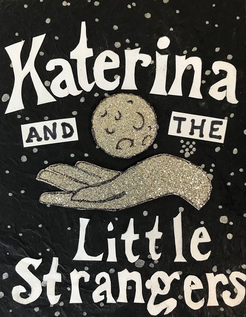cover of Katerina and the Little Strangers. The title appears in handcut letters on top of a black background dotted with silver stars. In the center of the image, a silver hand sits beneath a small silver moon.