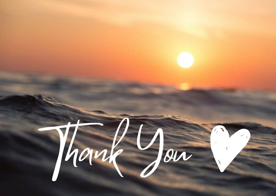Ocean waves at sunset with the words "Thank You" written in cursive