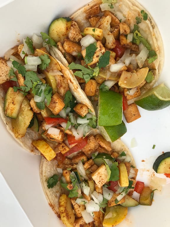 delicious tacos from Hermosas. Fried tofu, summer squash, and red peppers, topped with fresh onions and cilantro.